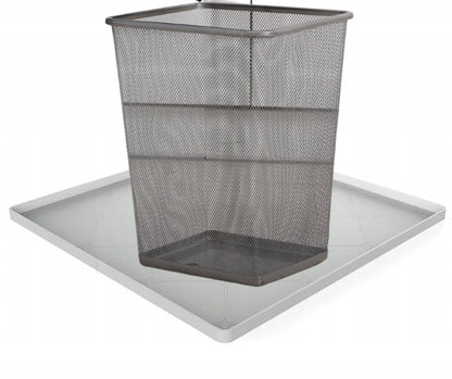A mat for the waste bin under the kitchen sink